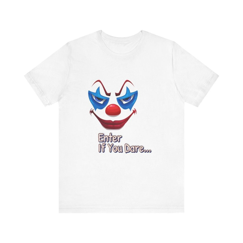 A crisp white t-shirt laid flat, showing a close-up of the scary clown face graphic with blue star makeup.